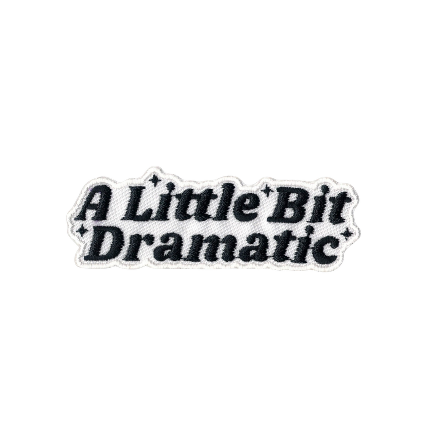 Text 'A Little Bit Dramatic' in black on a white background