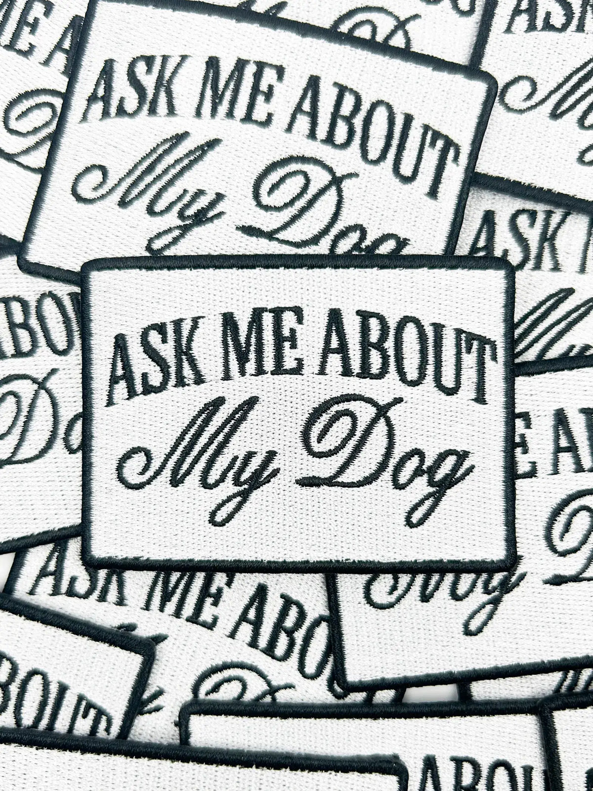 Stickers with 'Ask Me About My Dog' text on a white background