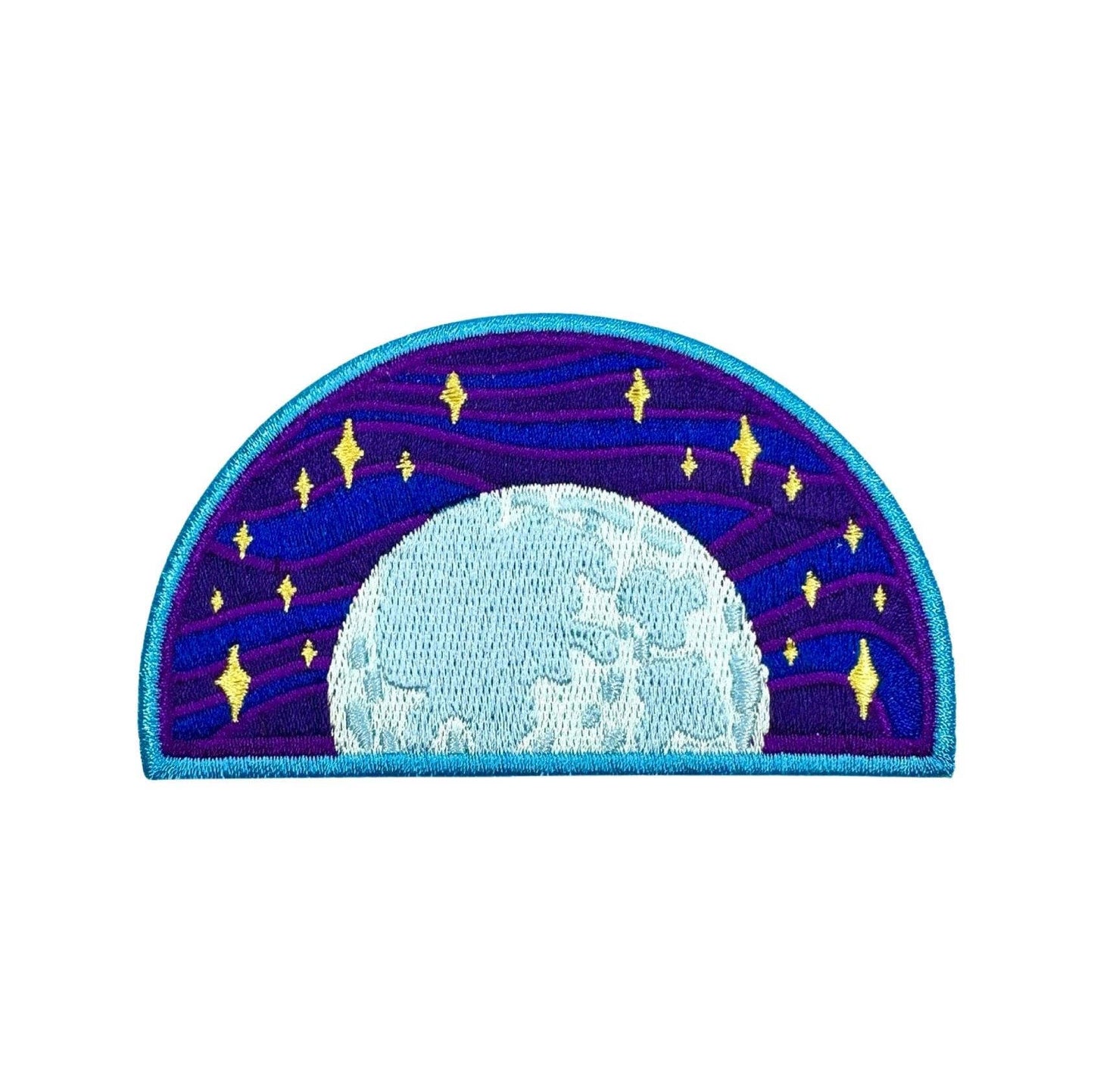 An embroidered patch depicting a celestial night sky with a large light blue moon and yellow stars against a purple and blue starry background, finished with a turquoise border.