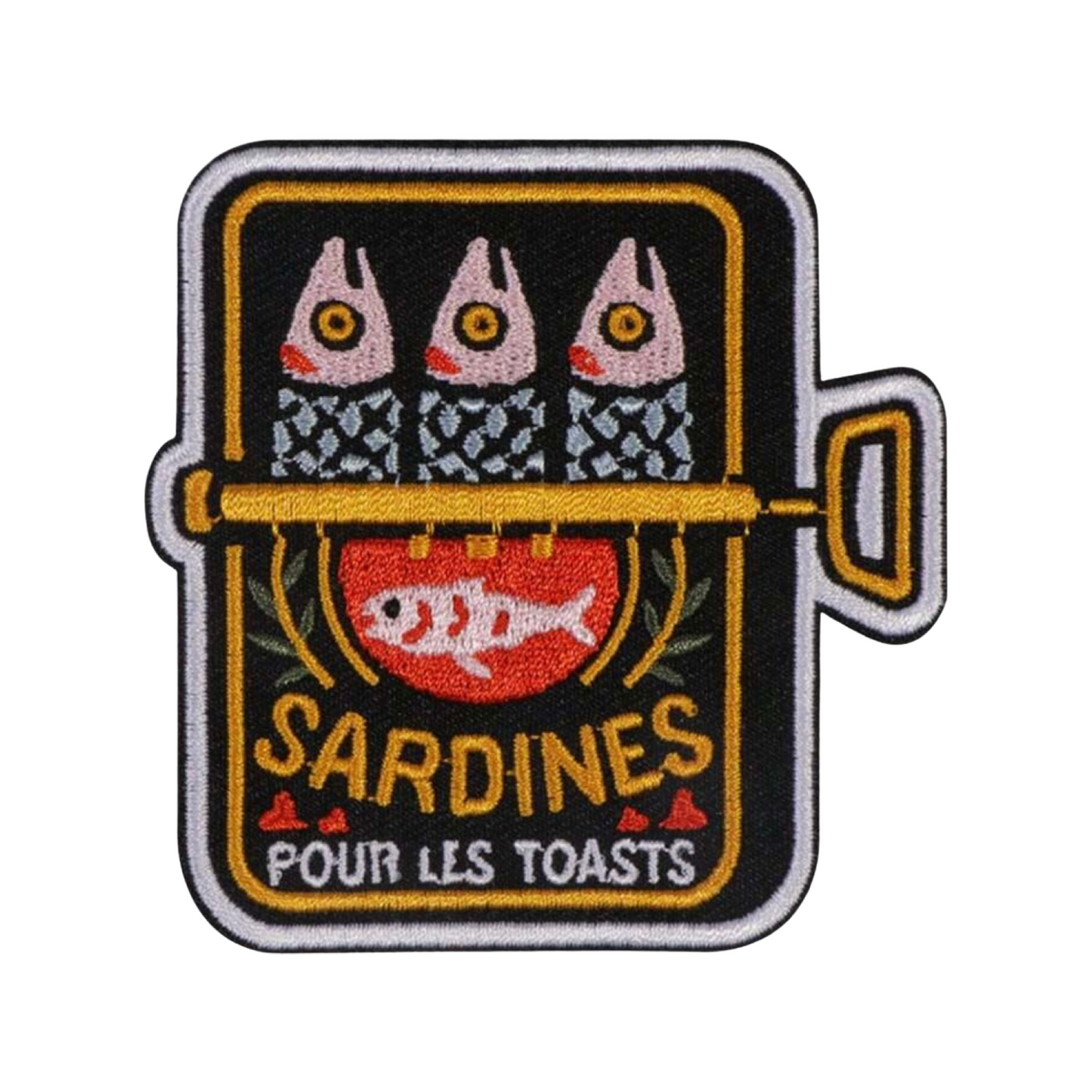 Embroidered patch of sardines in a can with text 'Sardines pour les toasts' on a white background
