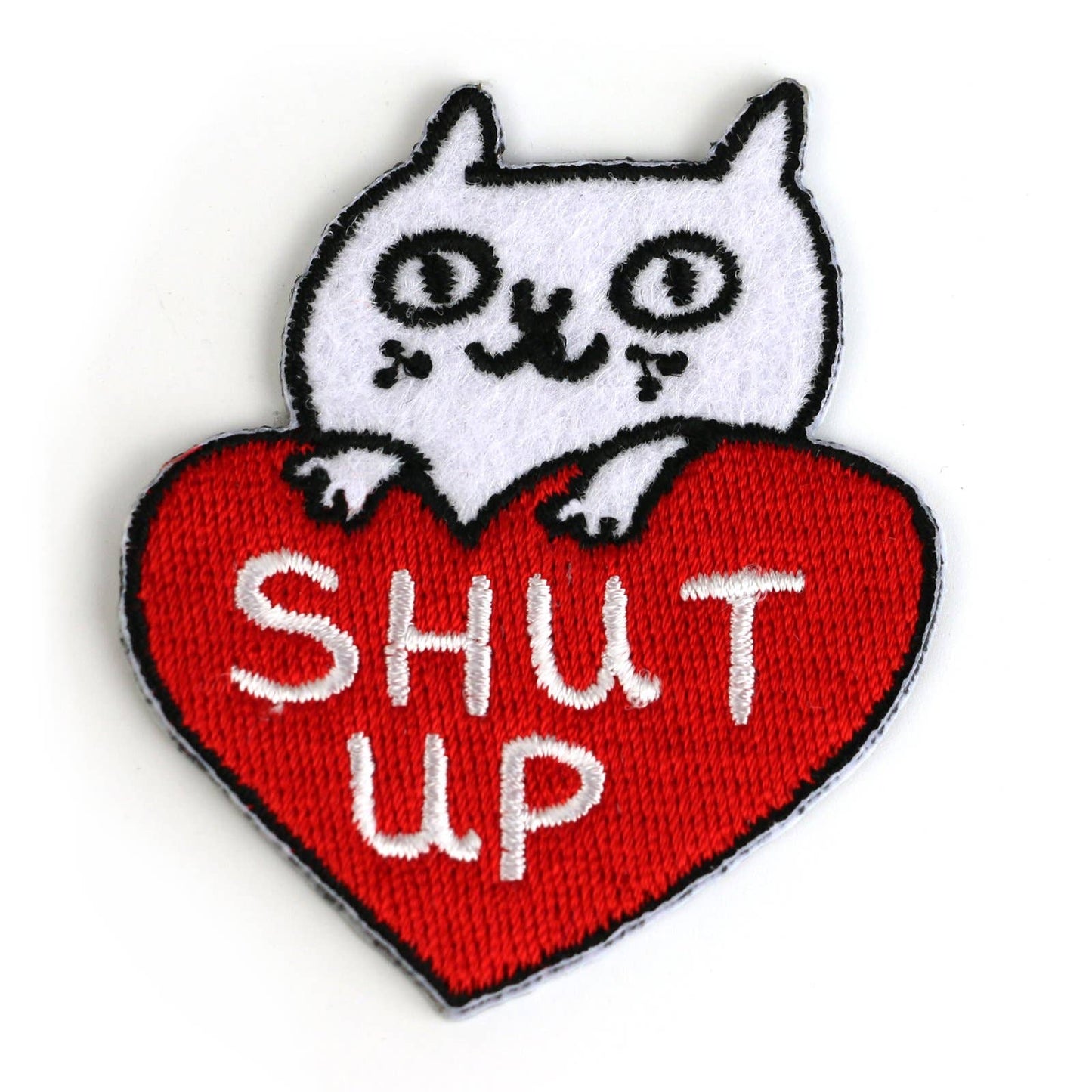 Embroidered patch with a white cat on a red heart-shaped patch with 'SHUT UP' text.