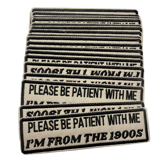 Stack of patches with humorous text on a white background