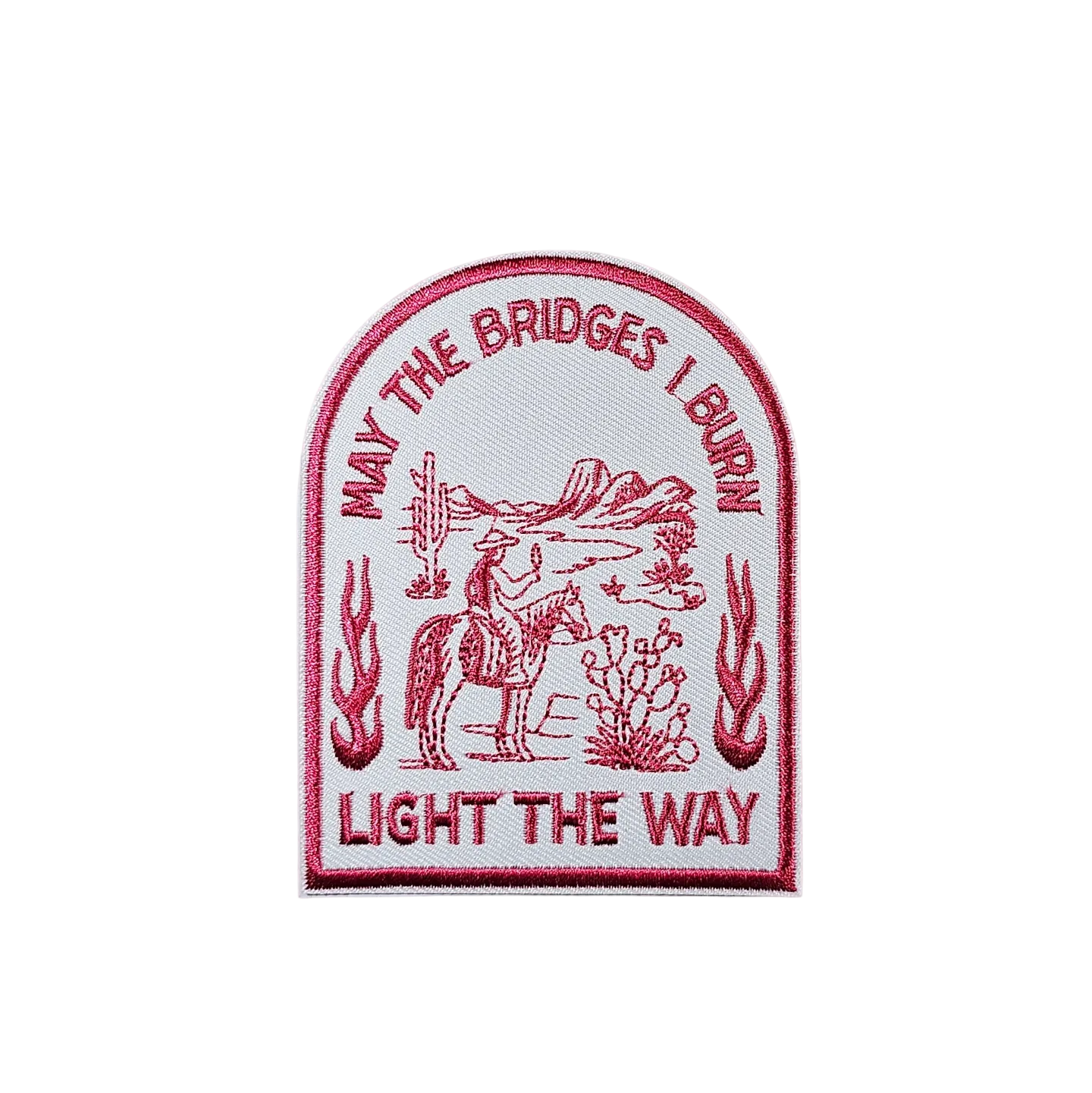 Embroidered patch with text and design on a white fabric background