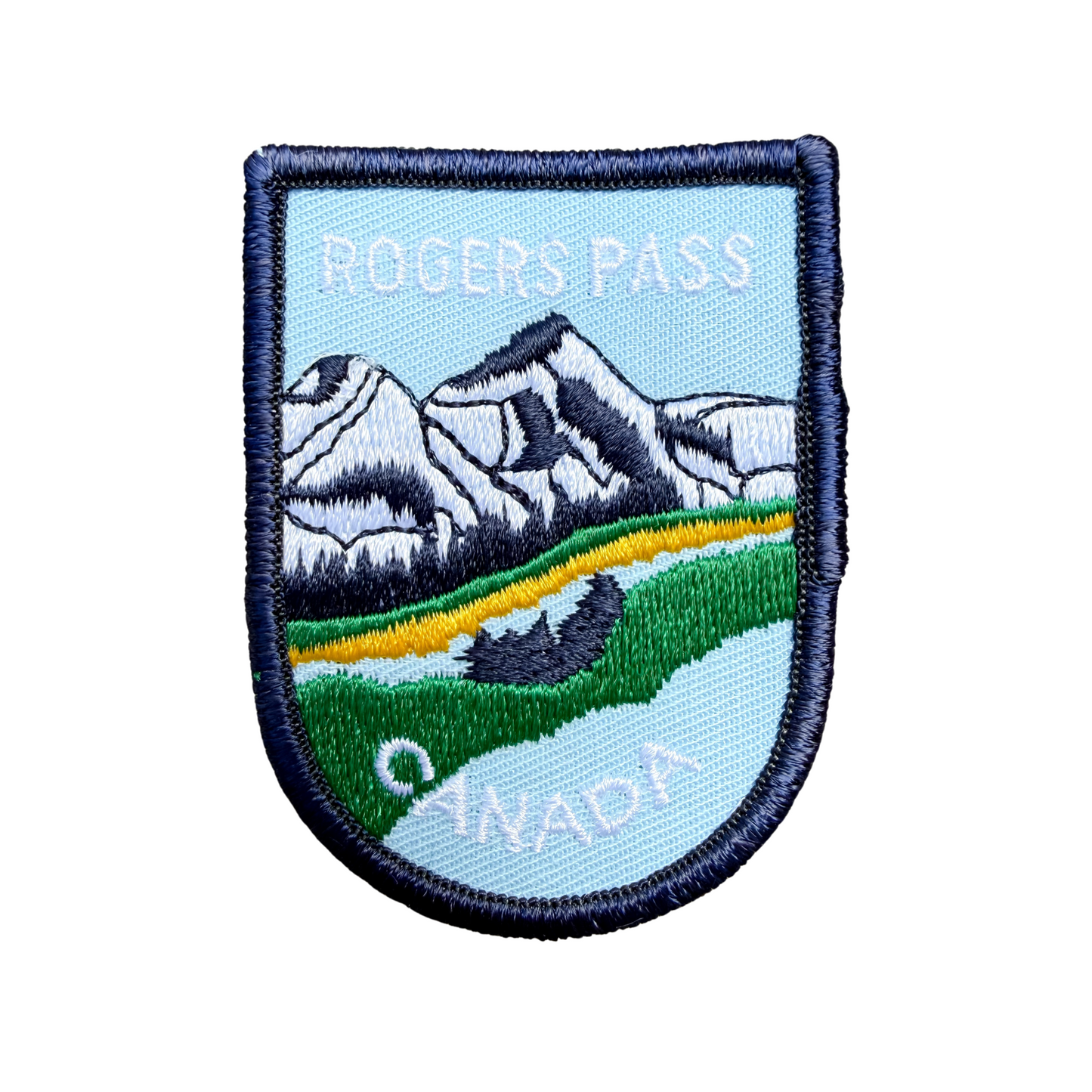 Embroidered patch with mountain landscape and 'Rogers Pass Canada' text on a white background