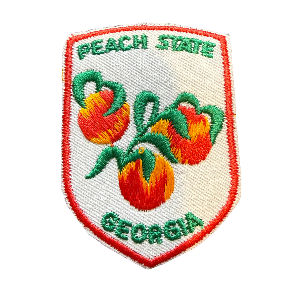 Vintage Georgia Peach State embroidered shield patch, three peaches on branch, white with orange border