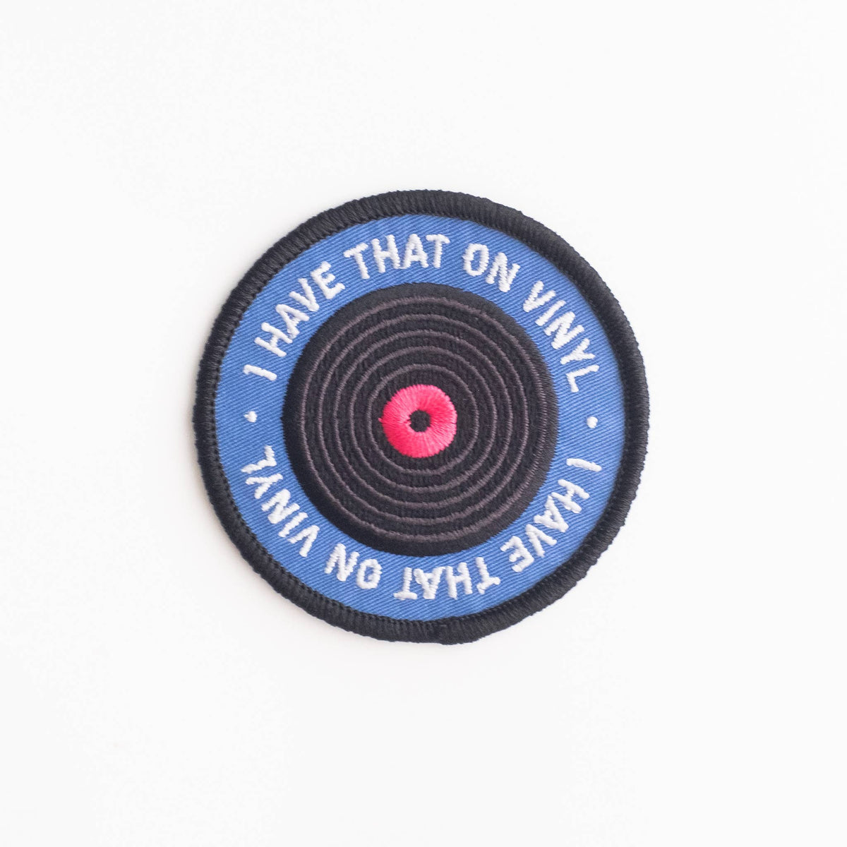 Round patch with vinyl record design and text 'I Have That On Vinyl' on a white background