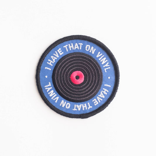 Round patch with vinyl record design and text 'I Have That On Vinyl' on a white background