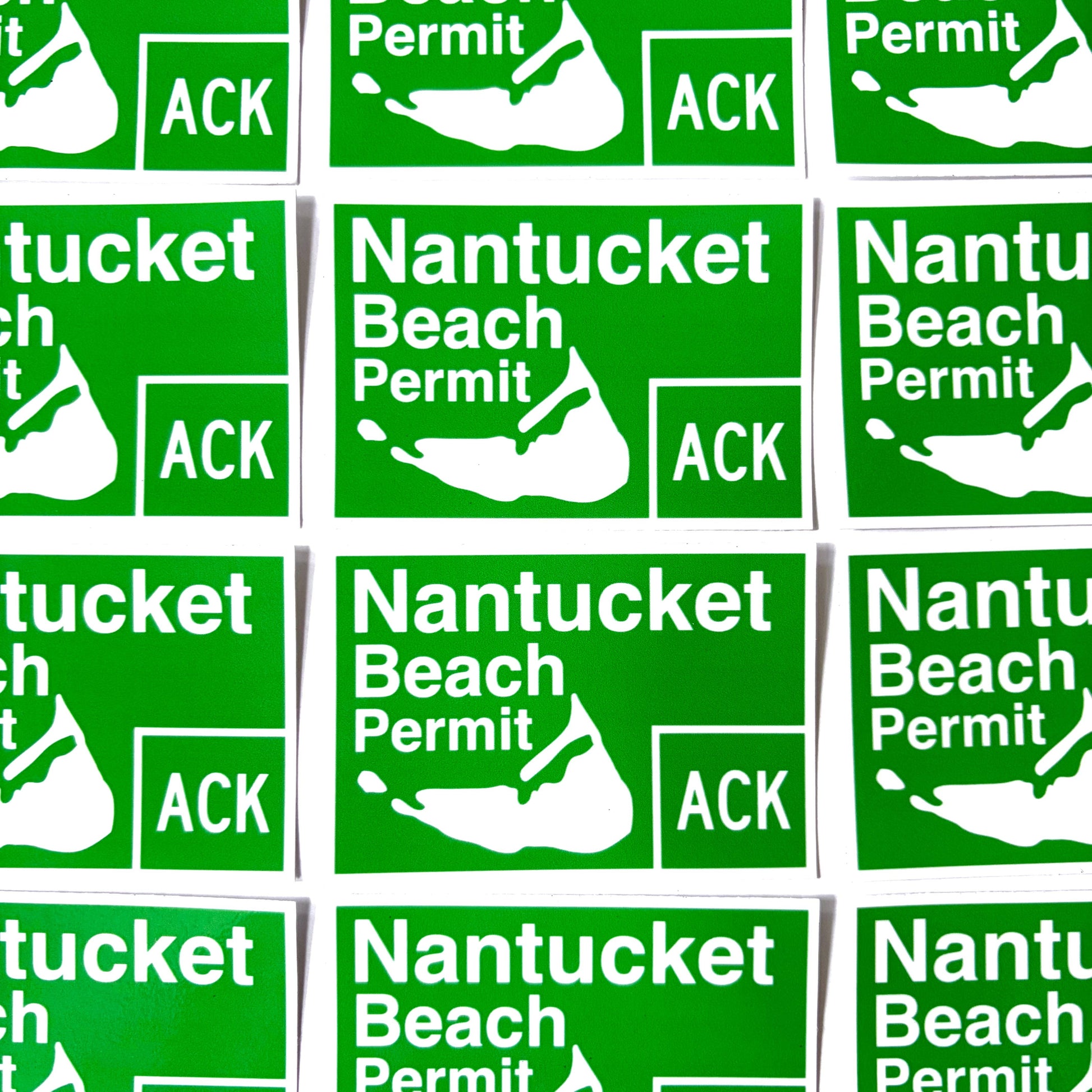 A grid of identical green rectangular stickers reading 'Nantucket Beach Permit' with a white map outline and 'ACK' in a box, shown on a white background.
