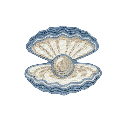 Embroidered design of an open shell with a pearl on a white background