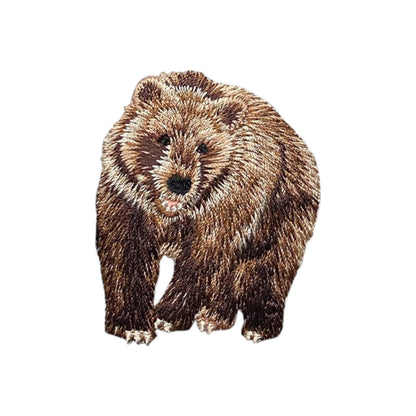 Embroidered bear patch on a white background