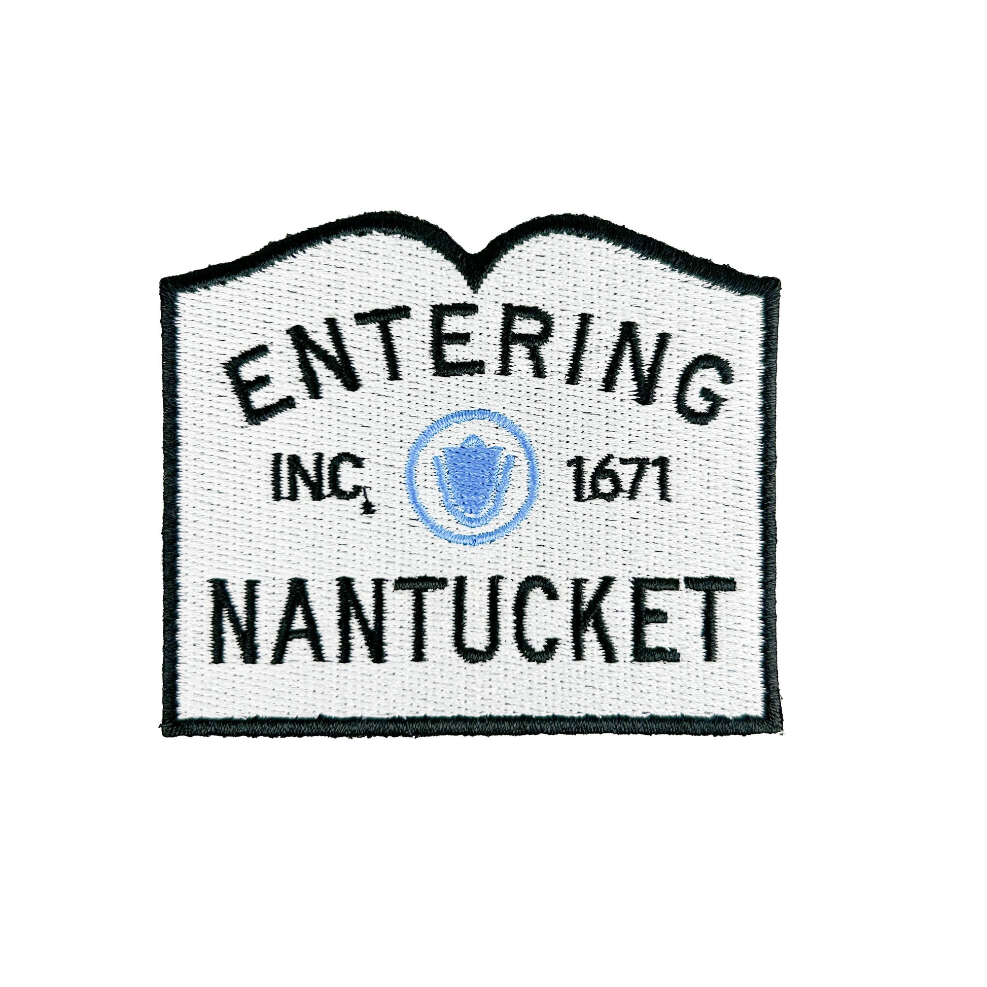 Embroidered patch with 'Entering Nantucket' text and logo on a white background