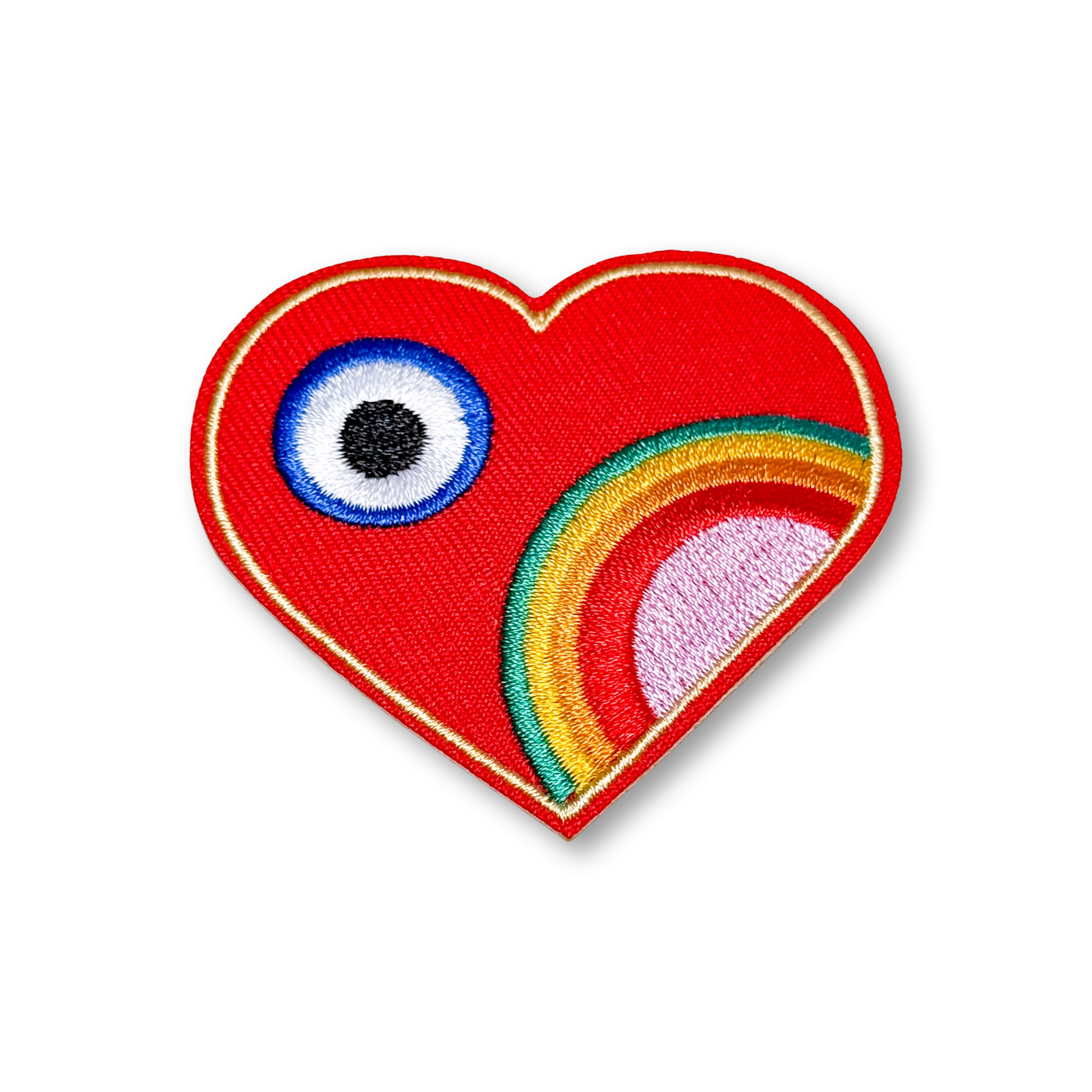 Heart-shaped patch with a rainbow and eye design on a white background