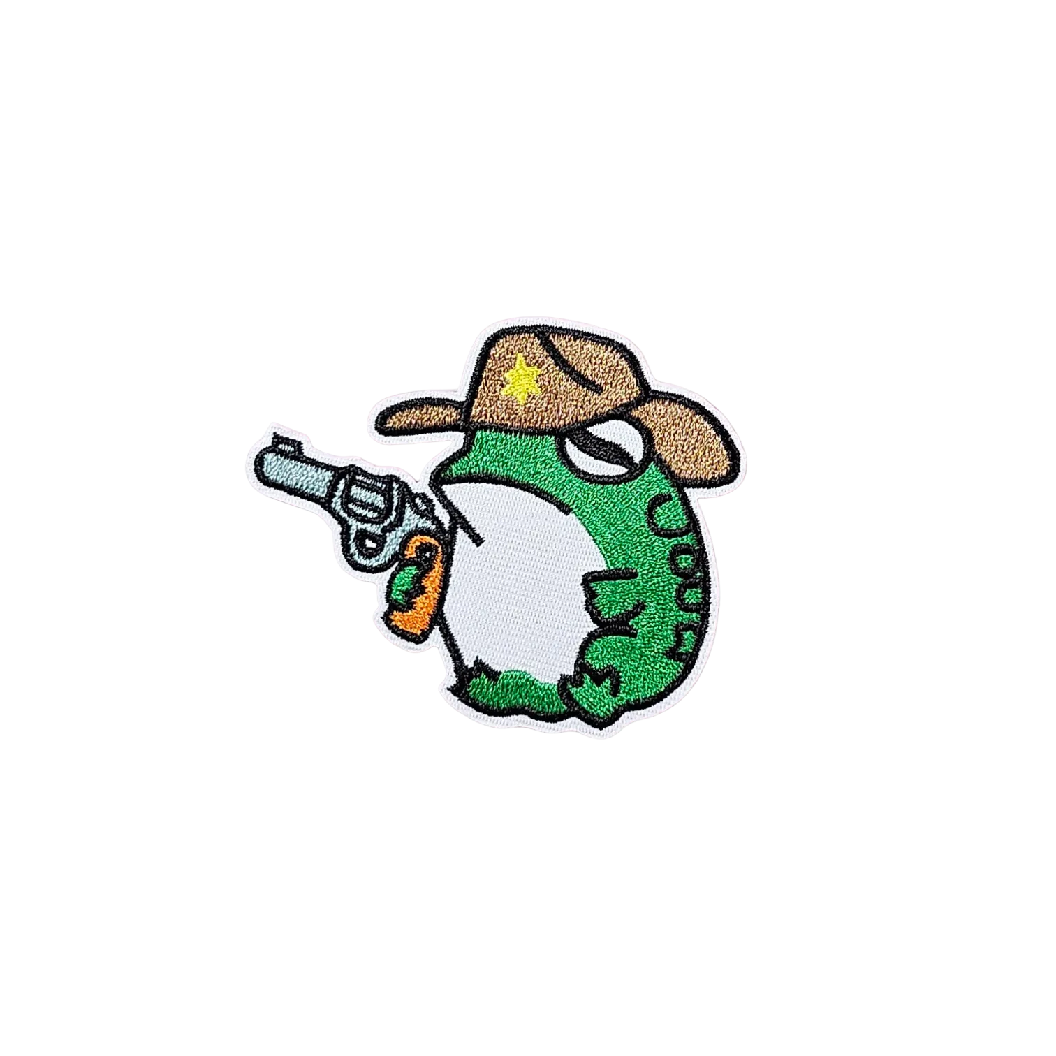 Embroidered patch of a green character with a cowboy hat and gun on a white fabric background