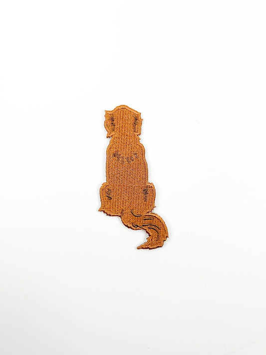Dog patch with golden retriever silhouette on a white background