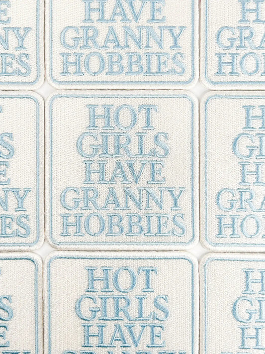 Text pattern with phrases like 'Have Granny Hobbies' and 'Hot Girls Have Granny Hobbies' on a tiled background.