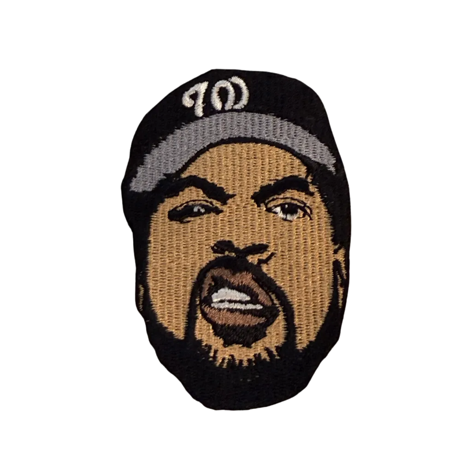 Embroidered patch of a person wearing a cap on a beige background