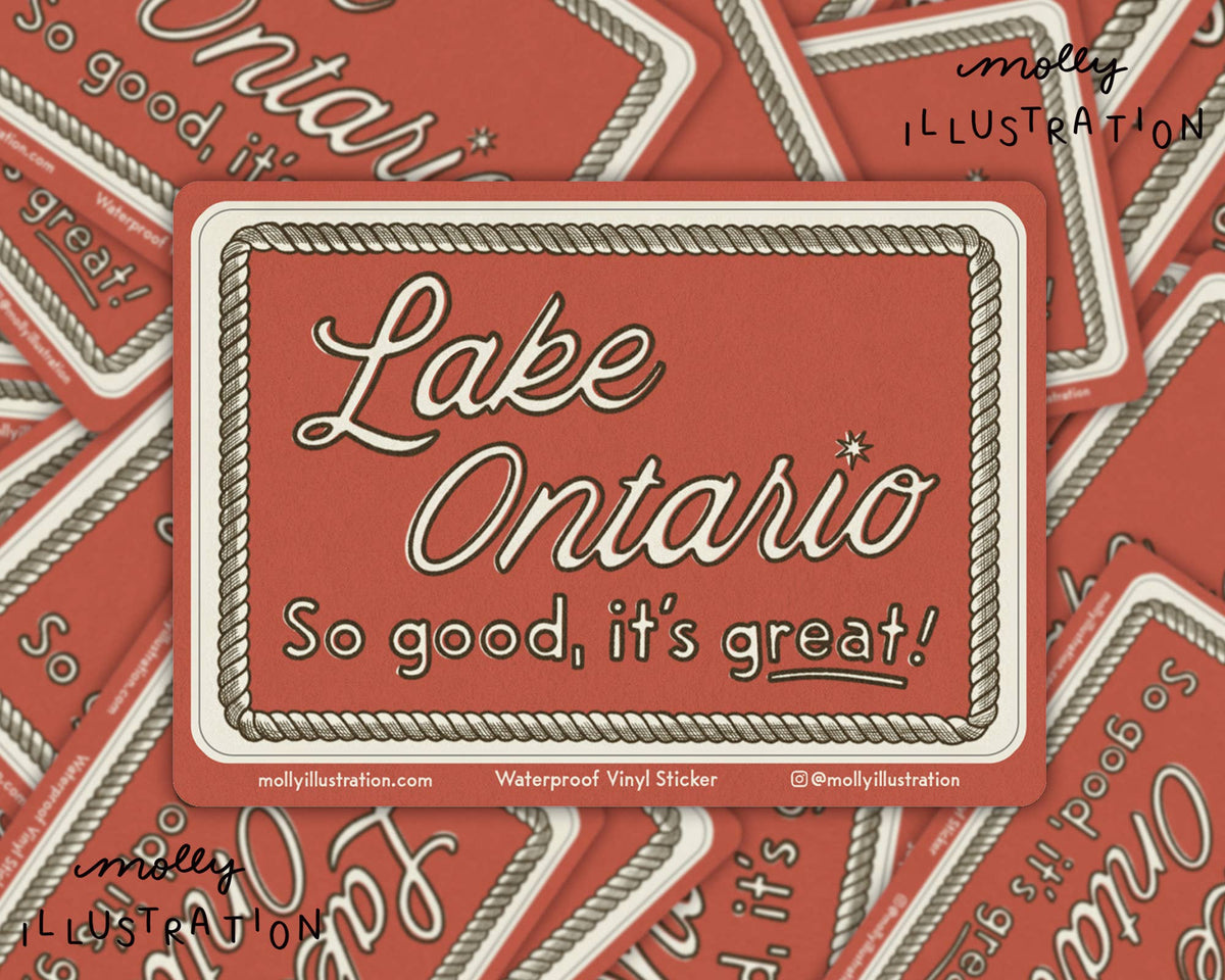 A rectangular vinyl sticker with rounded corners featuring the text 'Lake Ontario So good, it's great!' in white script and serif fonts, bordered by a rope-style frame. The sticker is shown layered over a repeating background of the same design, with Molly Illustration branding and product details printed along the bottom edge.