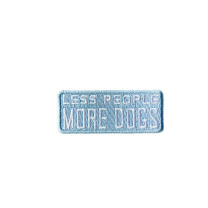 Embroidered patch with 'LESS PEOPLE MORE DOGS' text on a white background