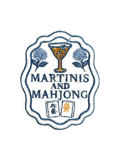 Embroidered patch with 'Martinis and Mahjong' text and a martini glass design.