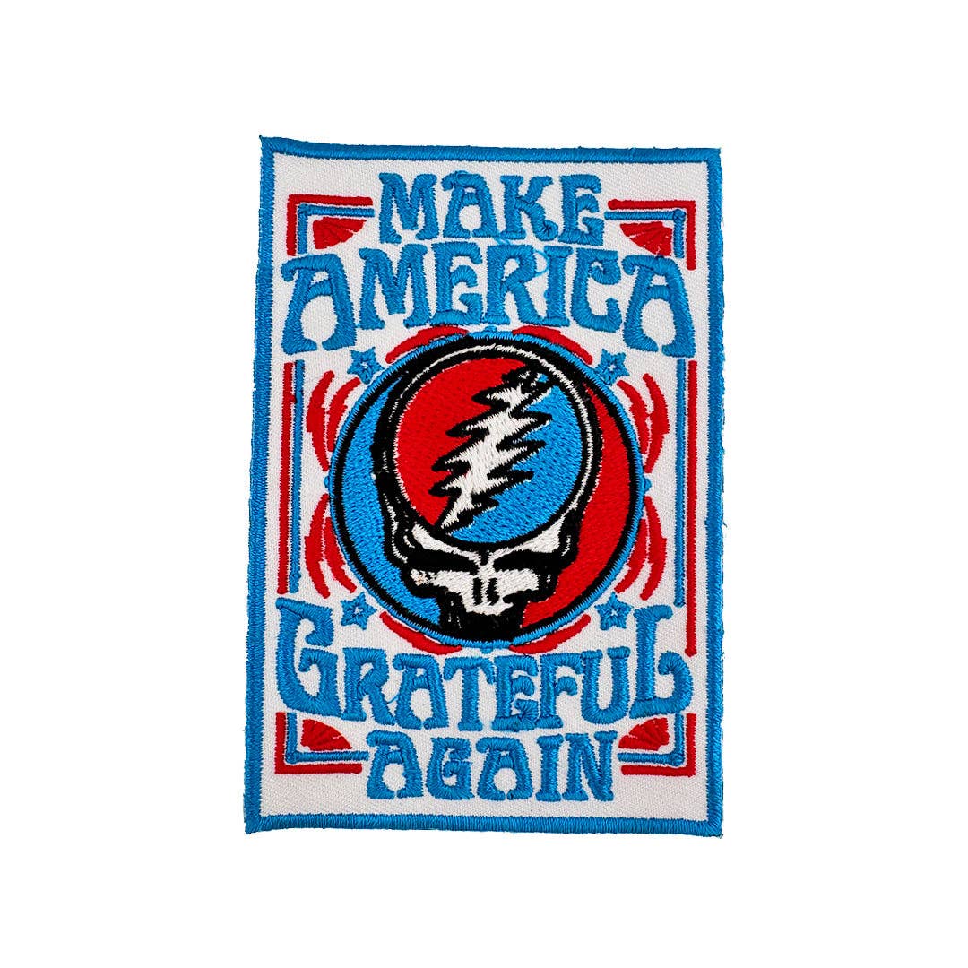 Embroidered patch with 'Make America Grateful Again' design featuring a skull and red and blue border on a white background.