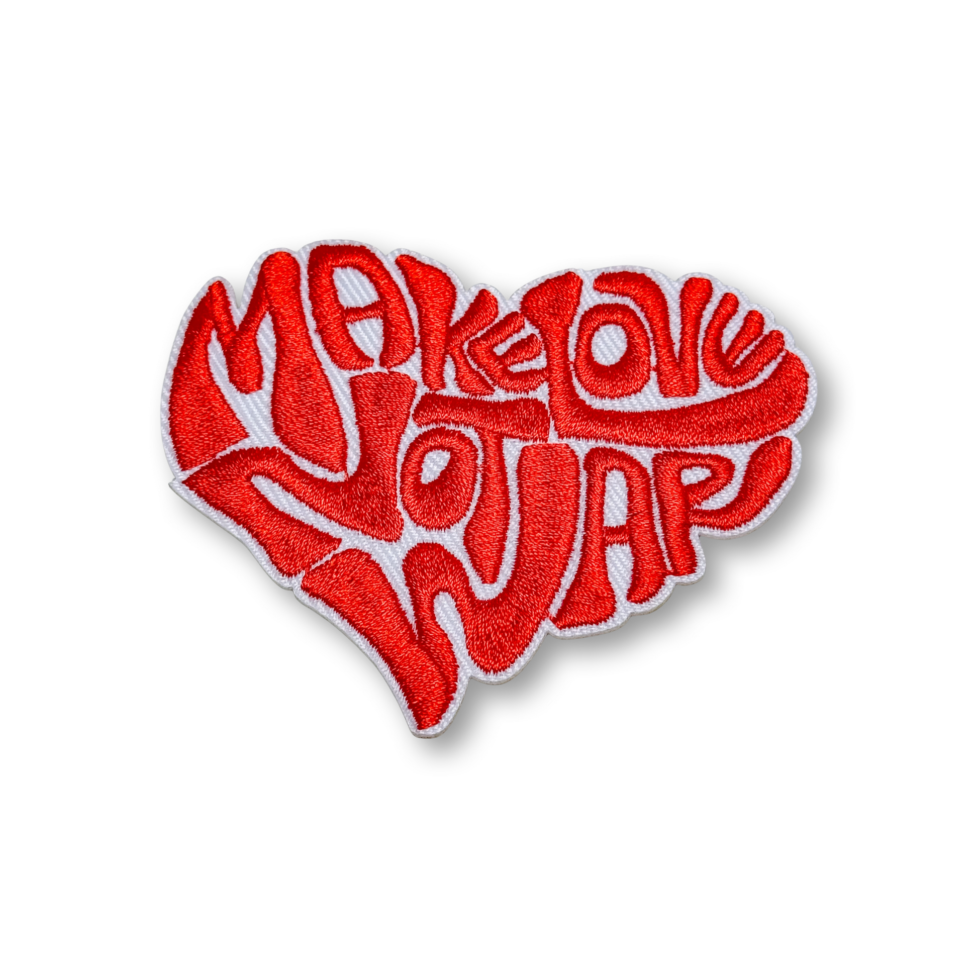 Heart-shaped patch with 'Make Love Not War' text in red on a white background