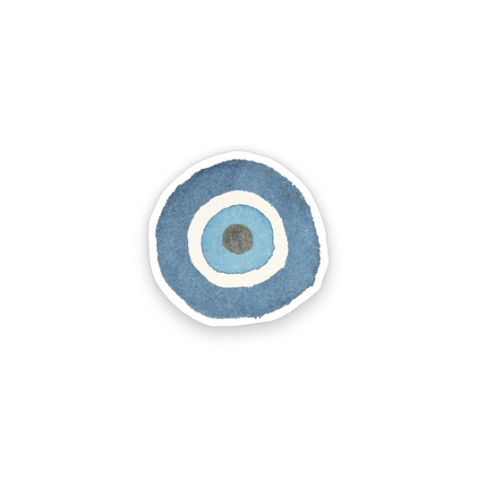 A circular sticker with a watercolor-style evil eye design in shades of blue, white, and a small gray center, shown on a plain white background.