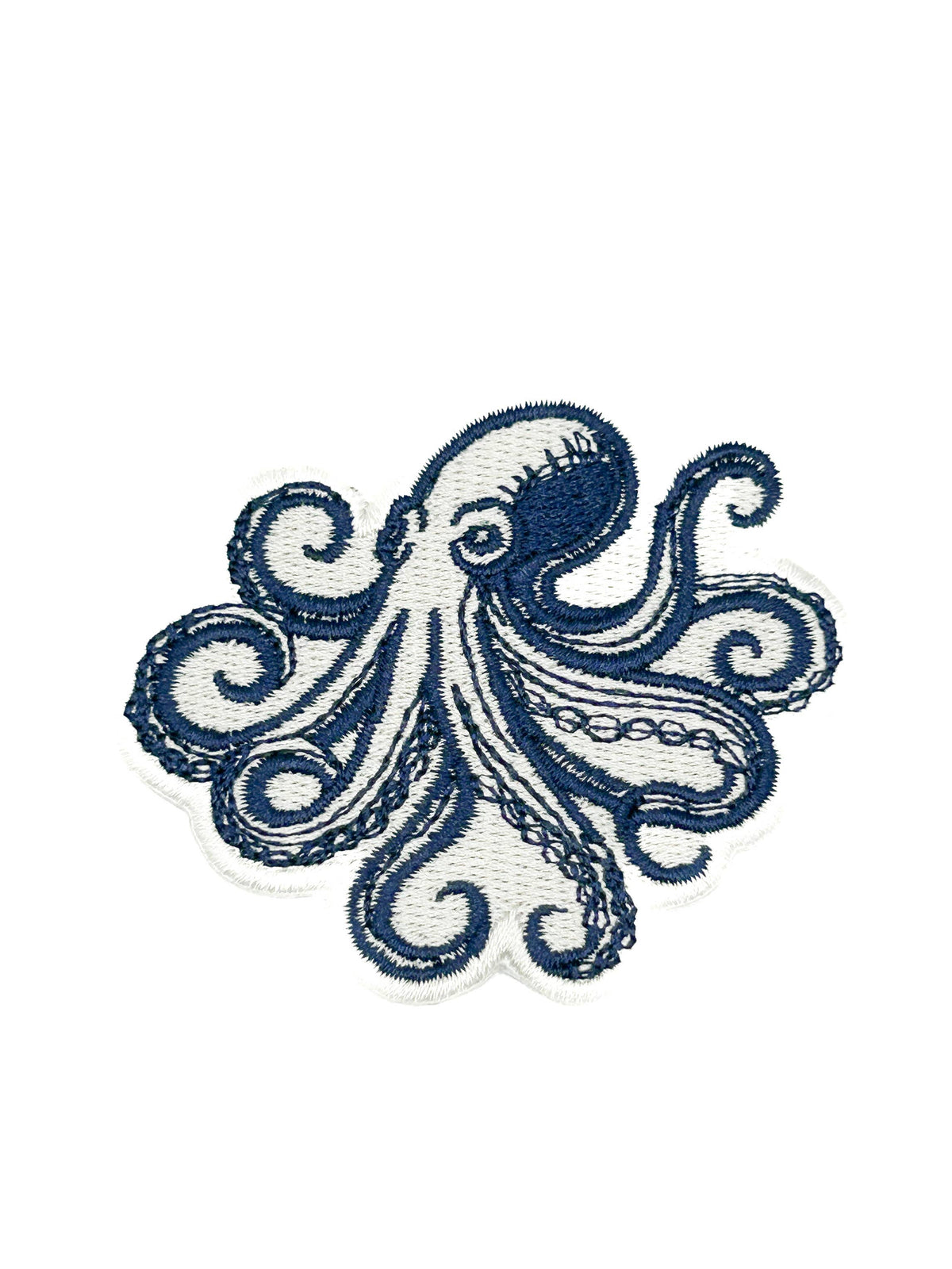 Navy blue octopus patch on a white background