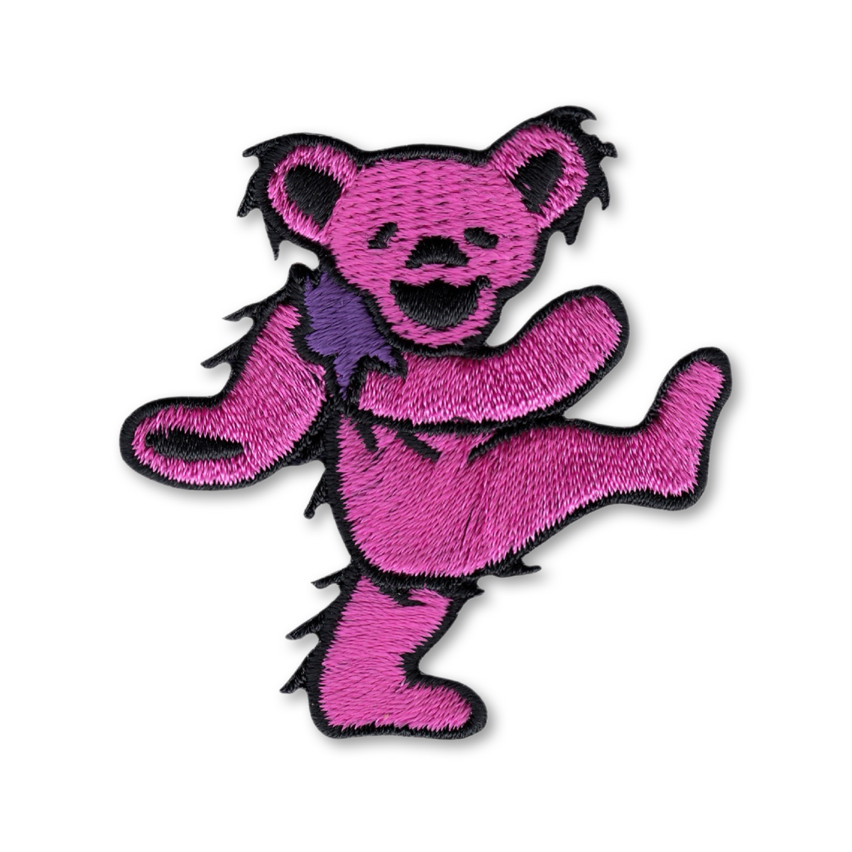 An embroidered patch of the Grateful Dead dancing bear, featuring a vibrant pink body with black embroidered outlines and facial features, and a purple neck scarf, set against a plain white background.