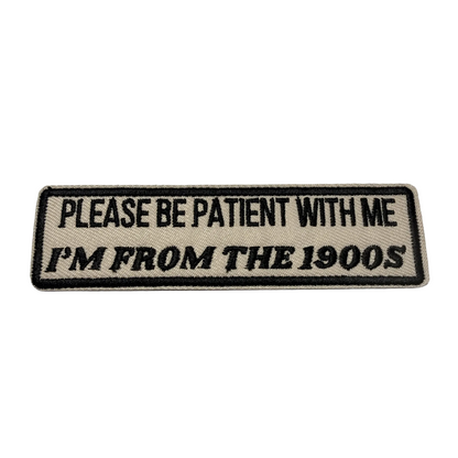 Patch with text 'Please be patient with me I'm from the 1900s' on a light gray background