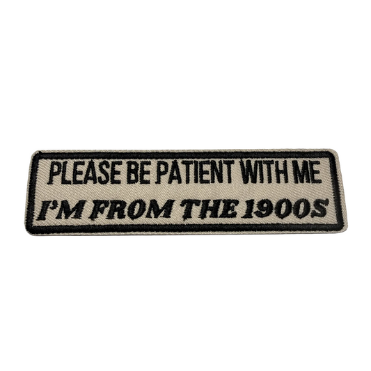 Patch with text 'Please be patient with me I'm from the 1900s' on a light gray background