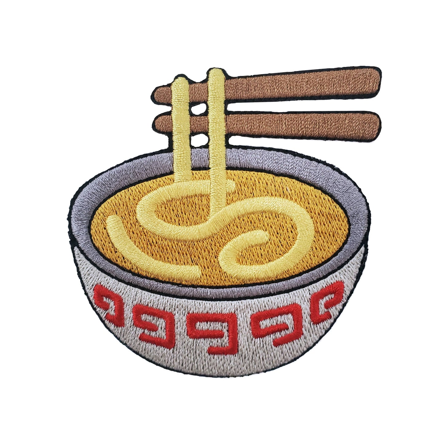 Embroidered patch of a bowl of ramen with chopsticks, featuring yellow noodles, brown chopsticks, a gray bowl rim, and red geometric patterns on a white bowl, isolated on a white background.