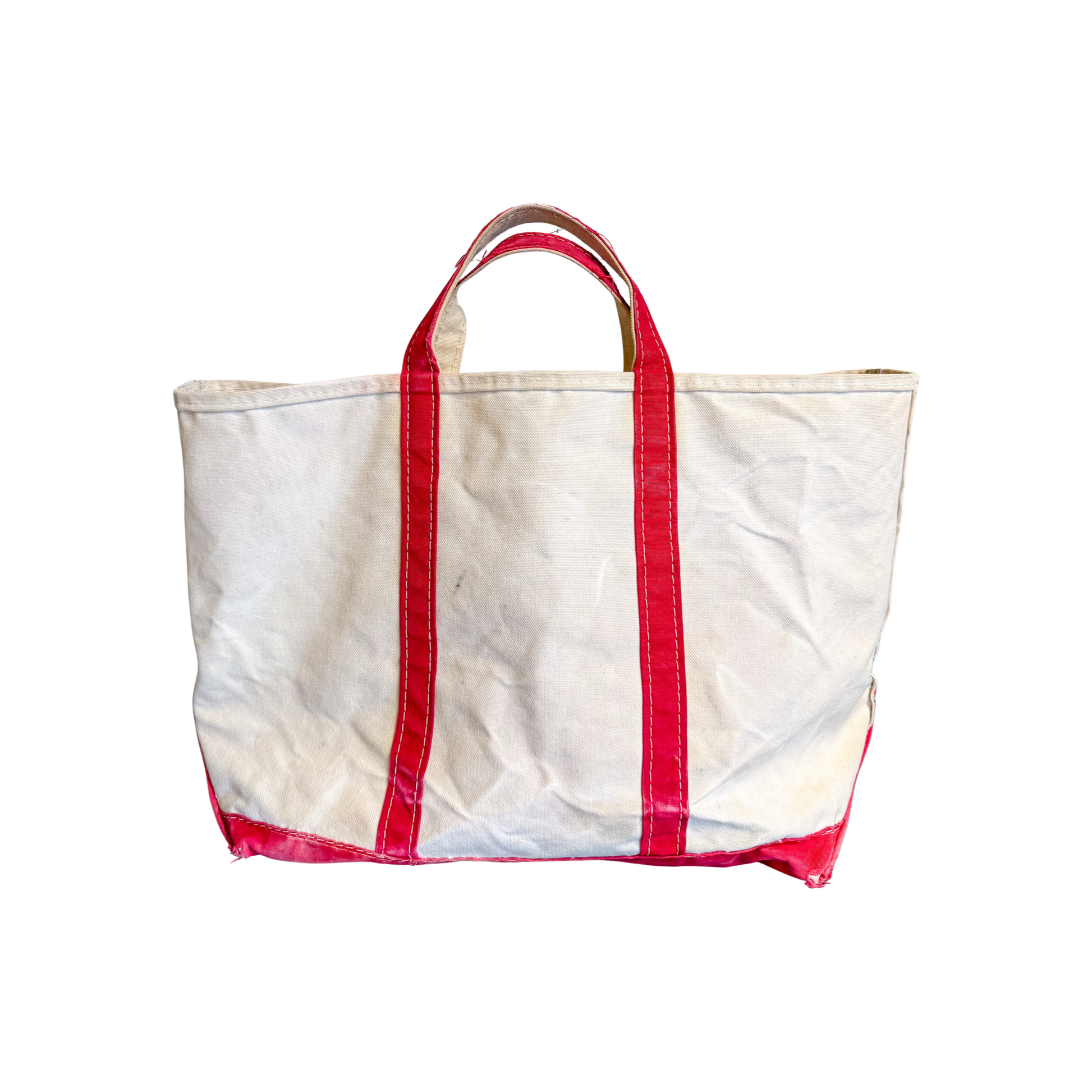 White tote bag with red handles and trim on a white background