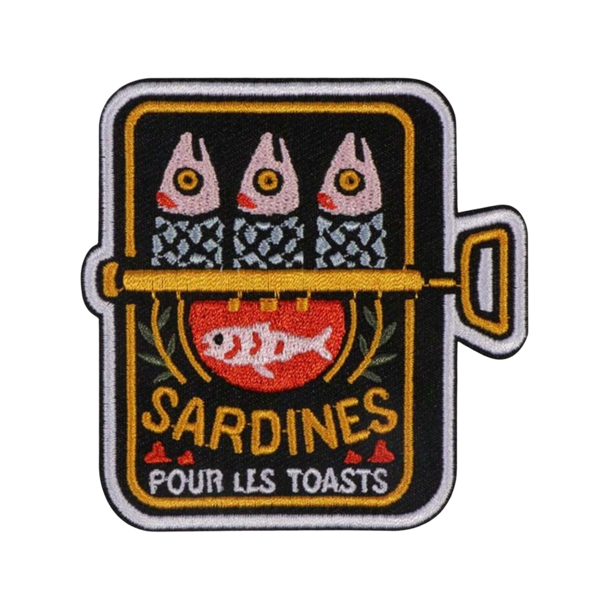 Embroidered patch of sardines in a can with text 'Sardines pour les toasts' on a white background
