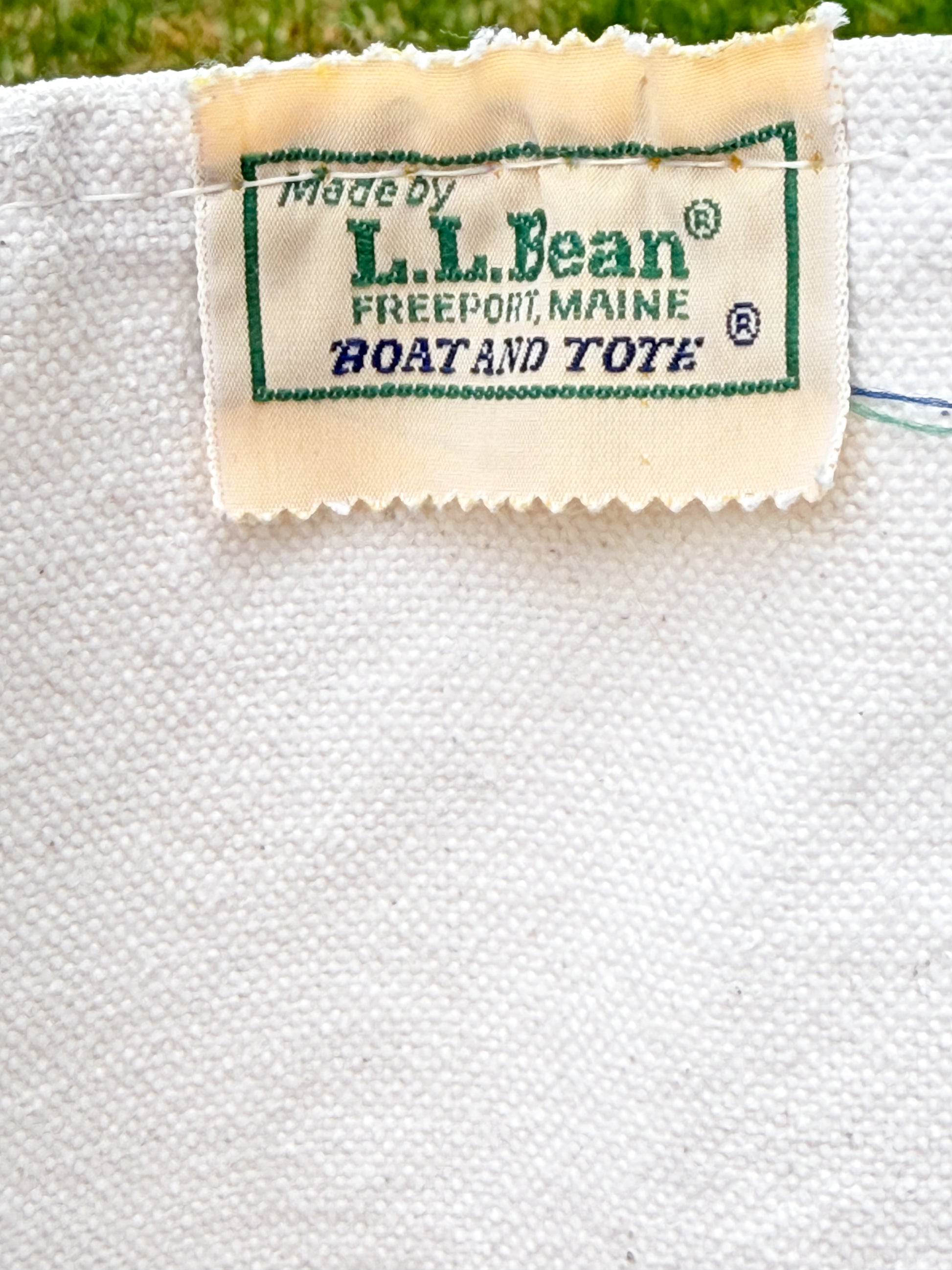 L.L. Bean label on a white fabric background