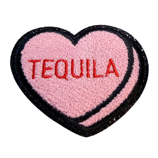 Heart-shaped patch with 'TEQUILA' text on a white background