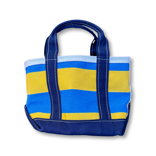 Blue and yellow striped tote bag on a white background