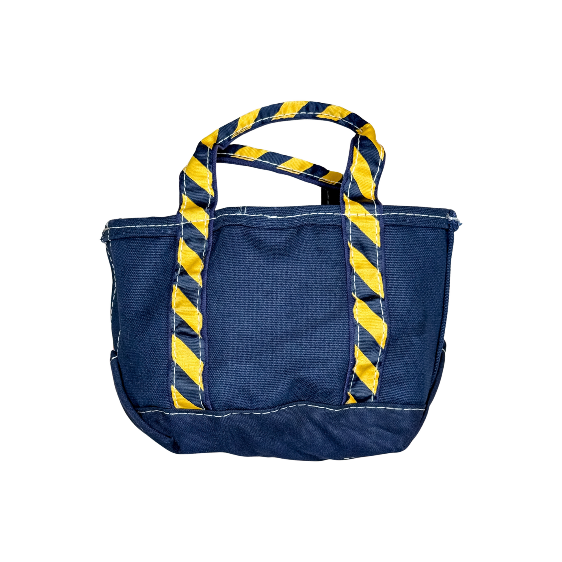 Blue tote bag with yellow and navy striped handles on a white background