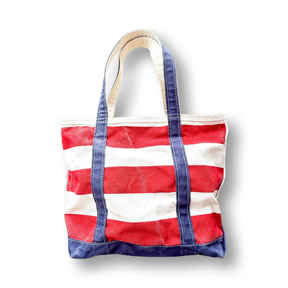 Red and white stripe tote with navy handles on white background 