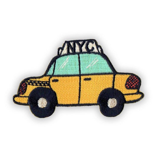 Embroidered patch of a yellow taxi with a green roof on a white background