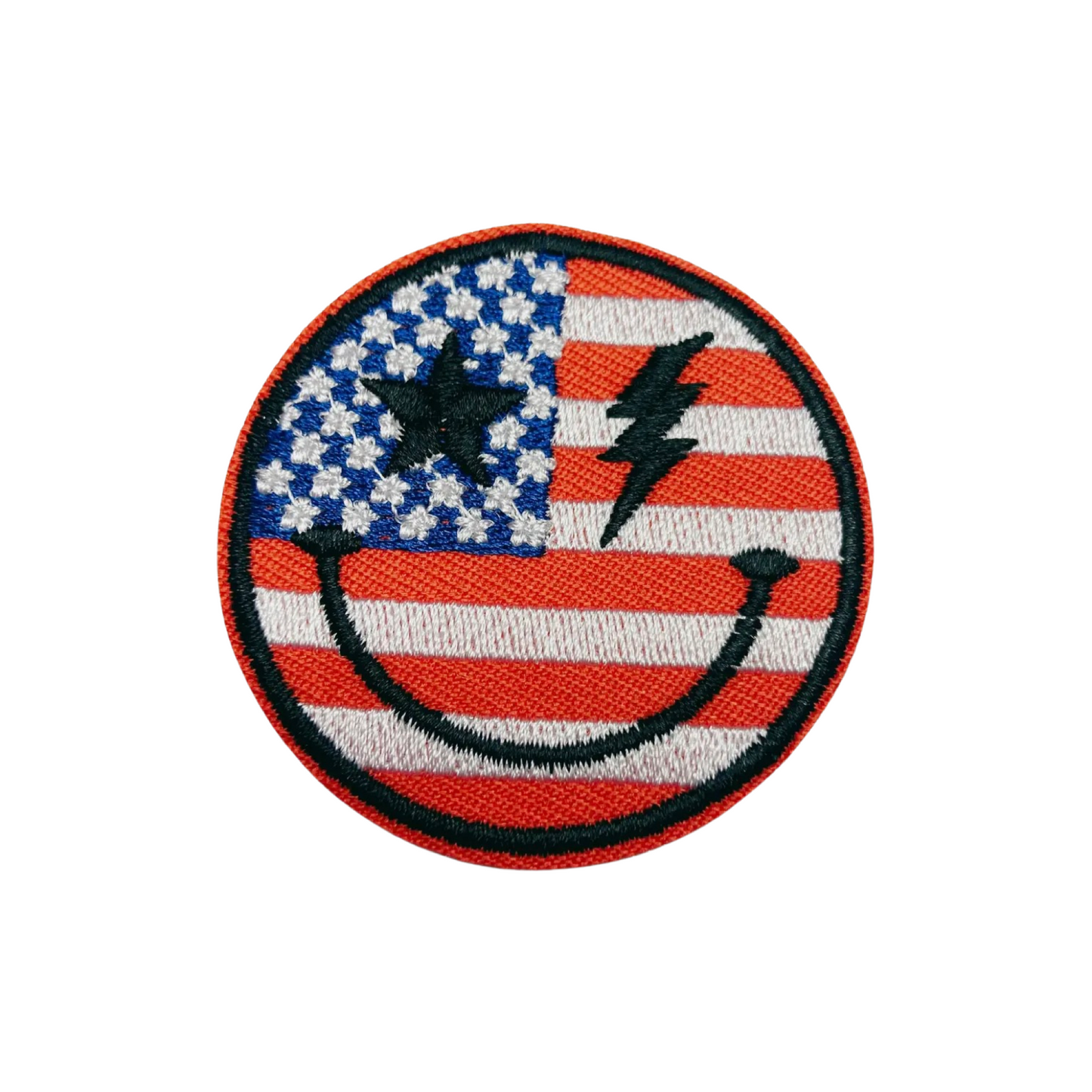 Smiley face patch with American flag design on a white background