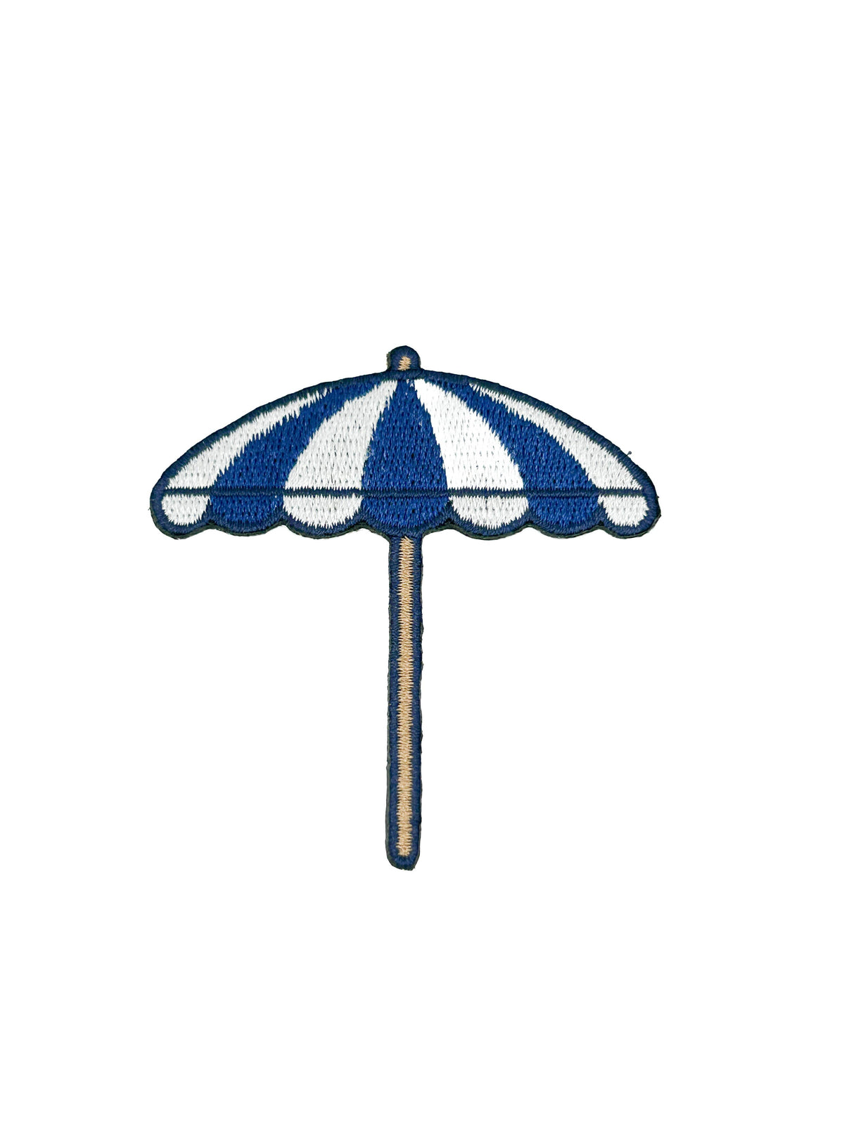 Blue and white striped umbrella patch on a white background