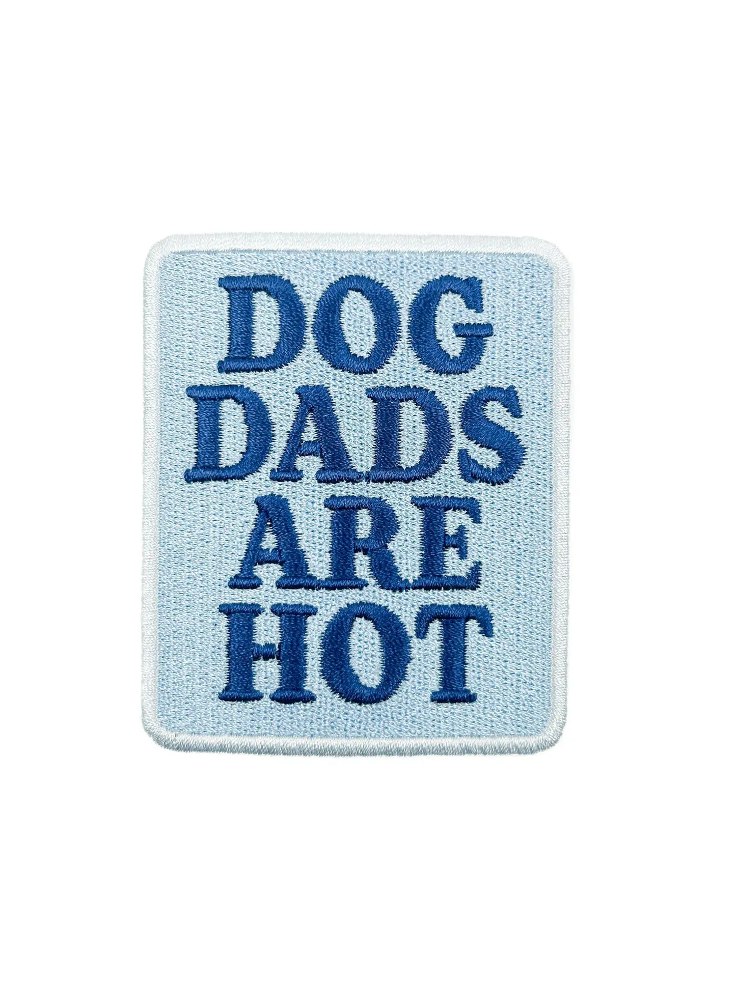Embroidered patch with 'DOG DADS ARE HOT' text on a light blue background