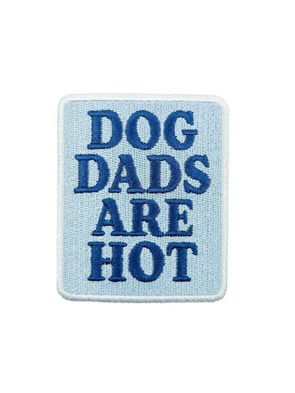 Embroidered patch with 'DOG DADS ARE HOT' text on a light blue background