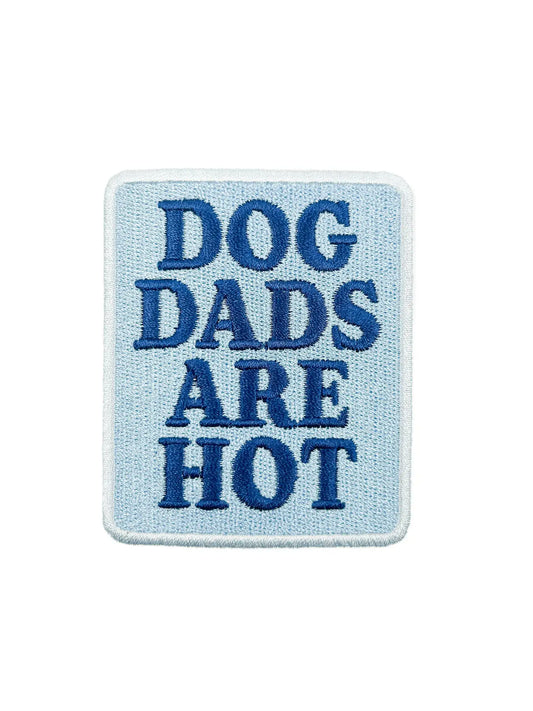 Embroidered patch with 'DOG DADS ARE HOT' text on a light blue background