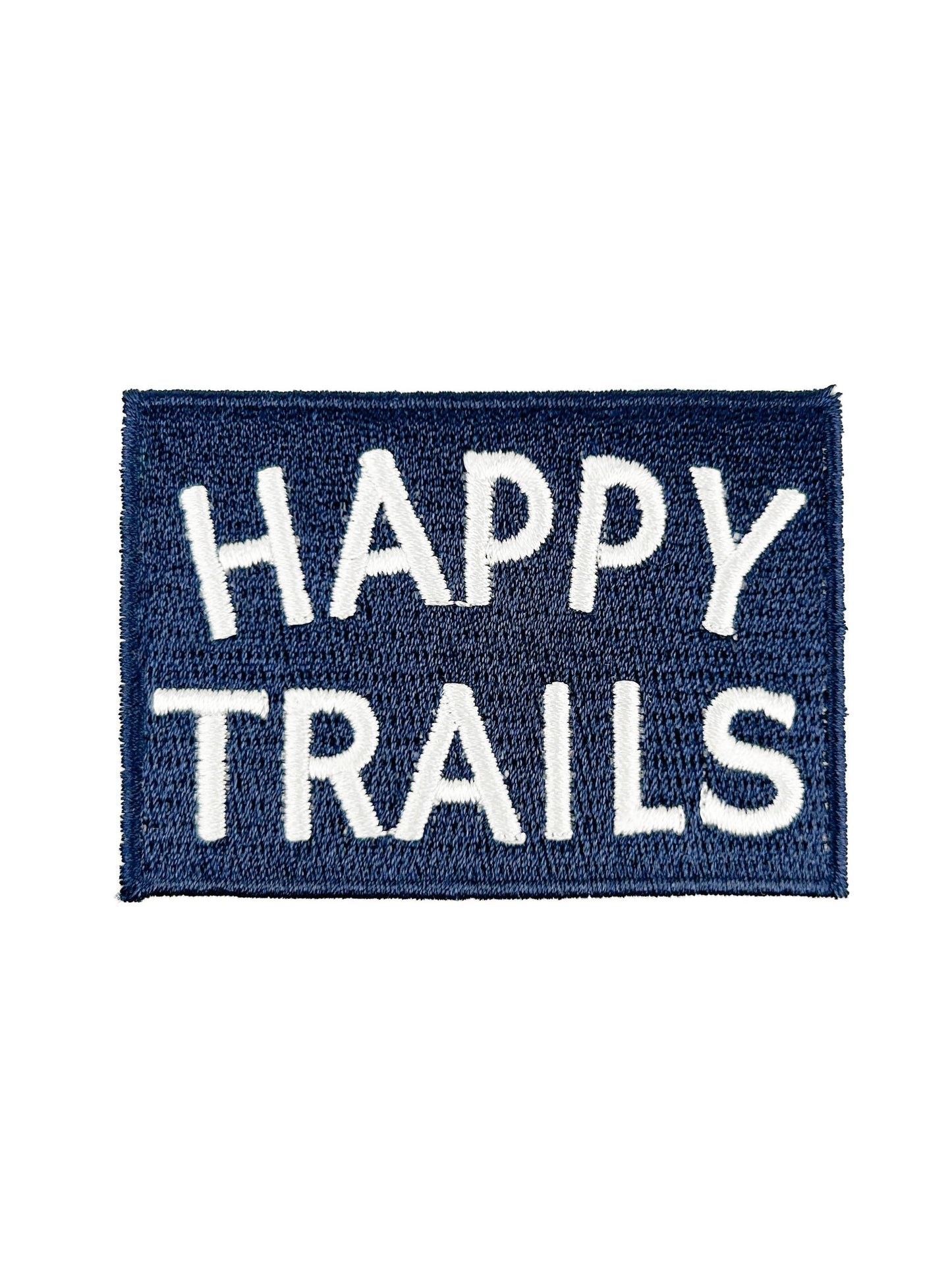 Navy blue patch with 'Happy Trails' text on a white background