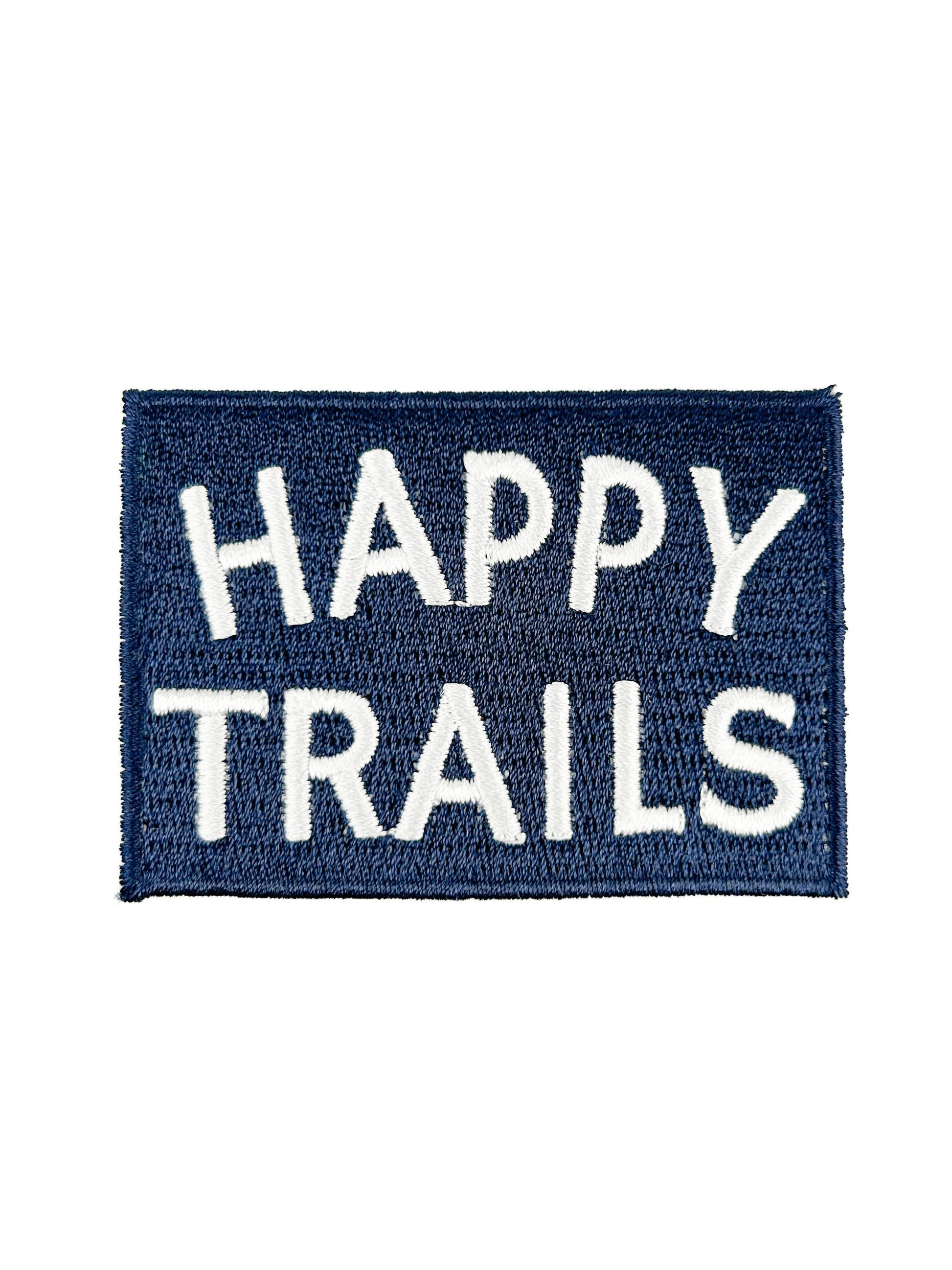 Navy blue patch with 'Happy Trails' text on a white background