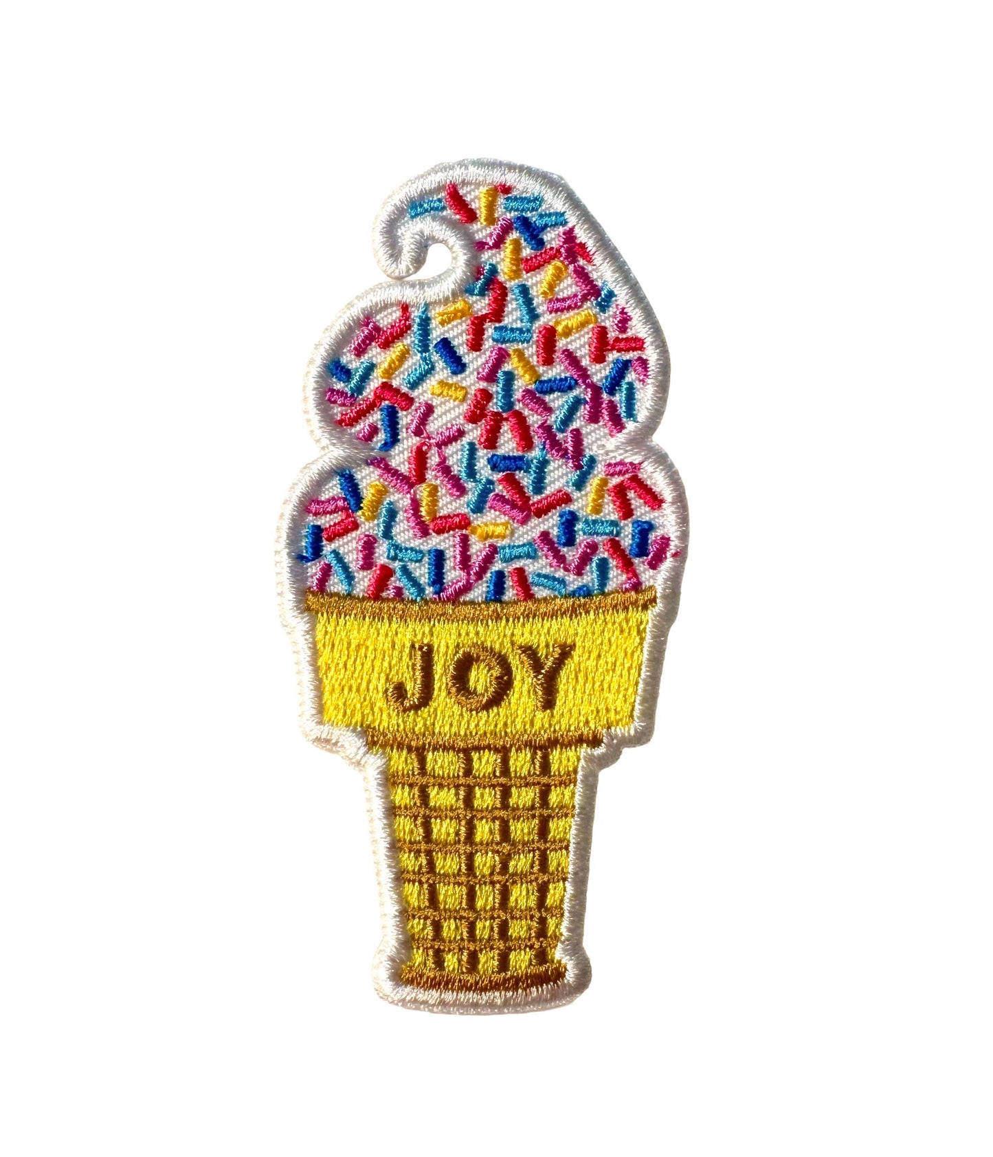 Ice cream cone patch with colorful sprinkles and 'JOY' text on a white background