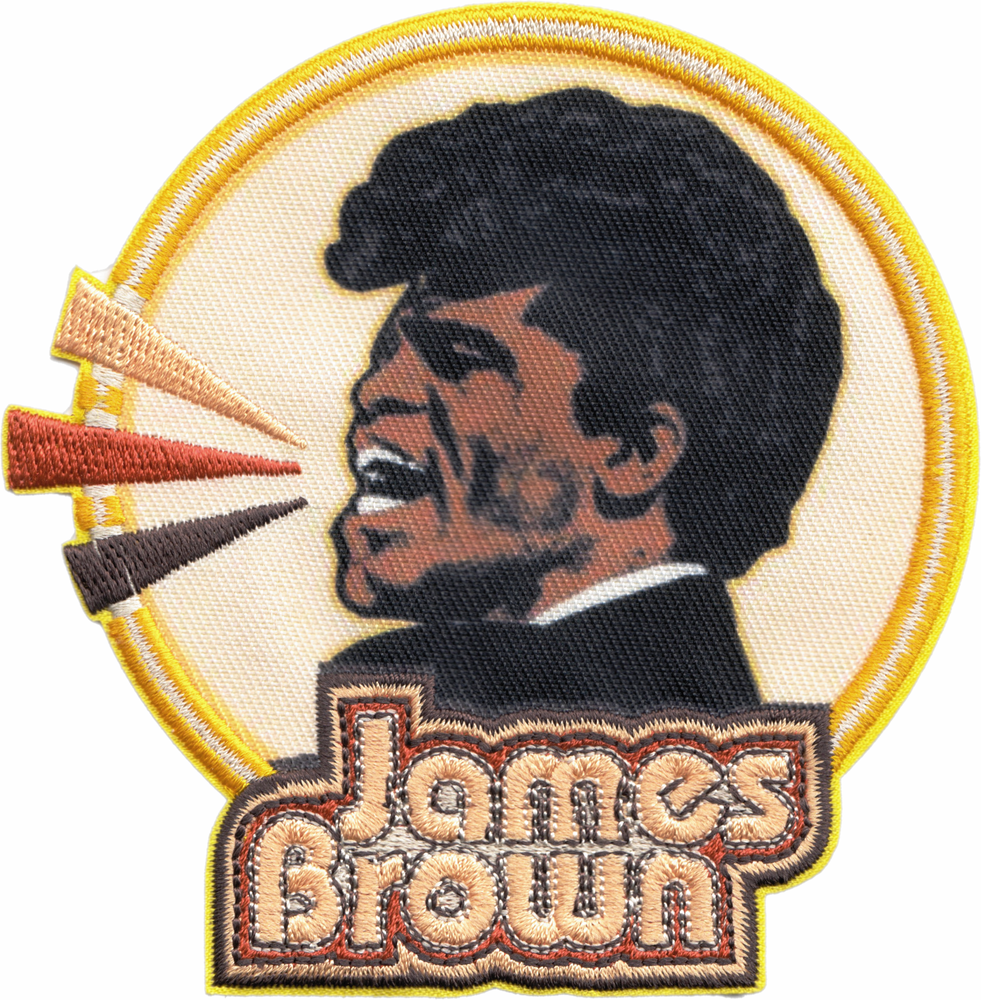 An embroidered oval patch featuring a side-profile portrait of James Brown with three colored microphones and the text 'James Brown' at the bottom, shown on a plain white background.