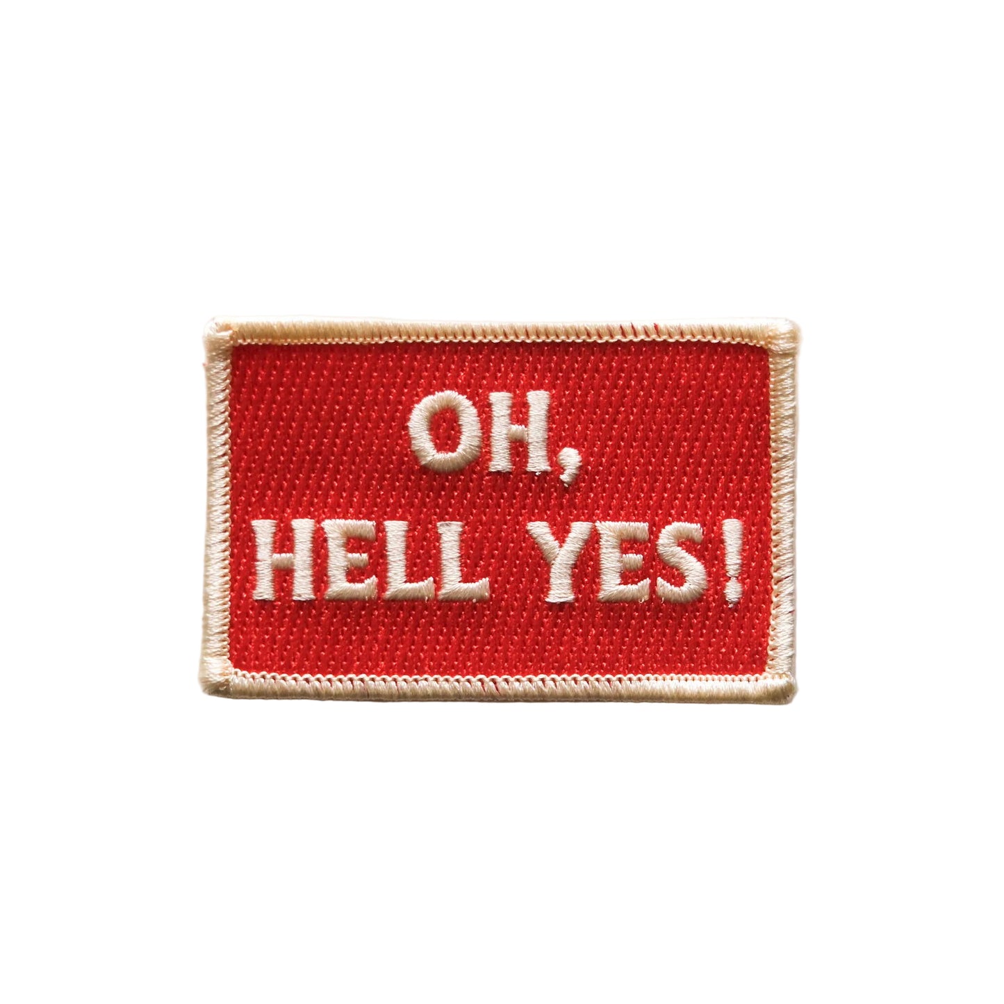 Red patch with 'OH, HELL YES!' text on a light gray background