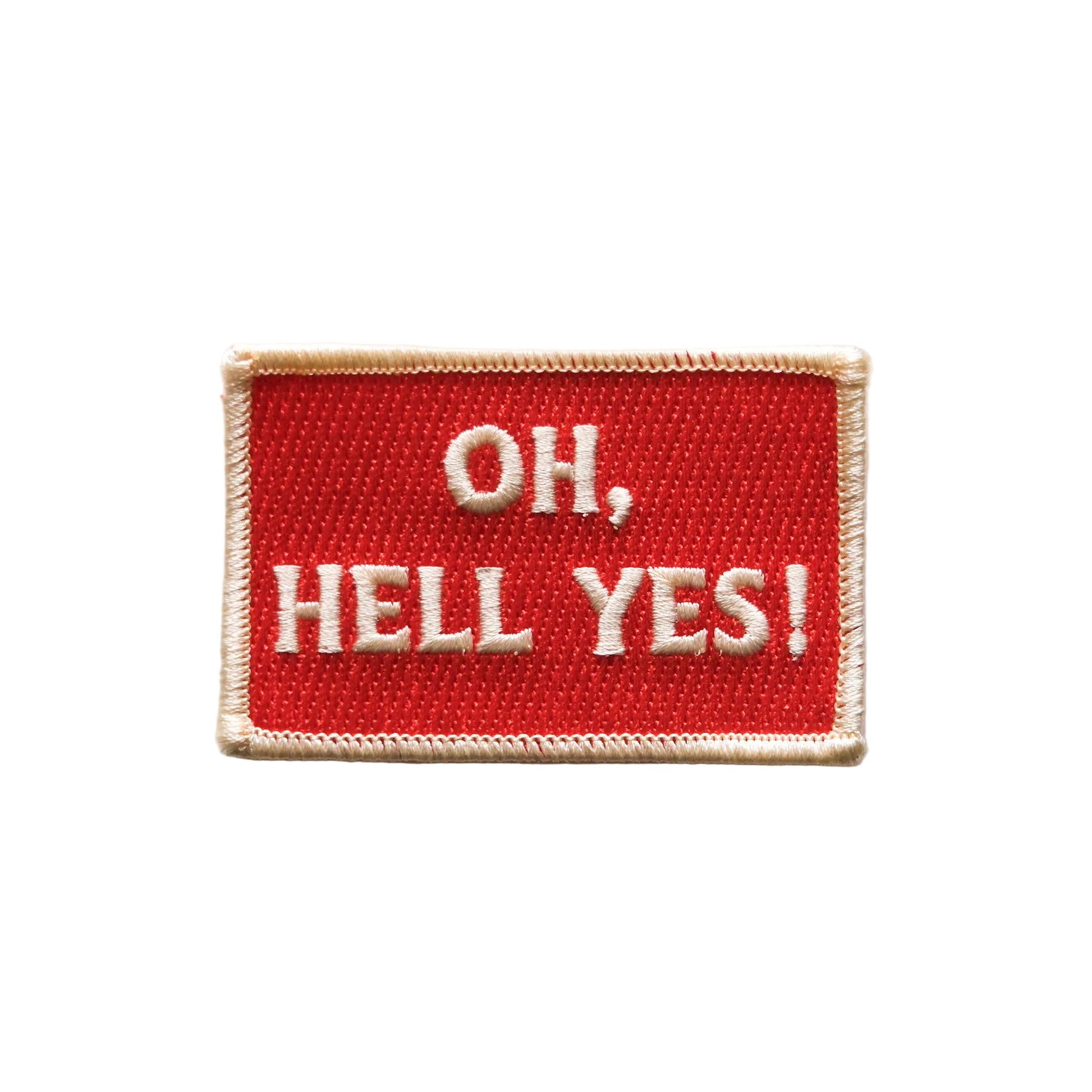 Red patch with 'OH, HELL YES!' text on a light gray background